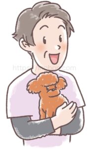 小型犬を抱く笑顔の女性飼い主