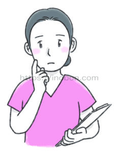 片手を顔に当てて何か考えている看護師の女性