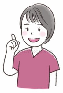 人差し指を上に向けたポーズの女性看護師