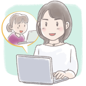 パソコン画面で受講生とやりとりをする講師の女性