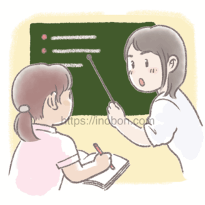 セミナーを受講している女性とレクチャーする講師