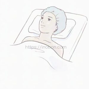 ベッドで仰向けになっている