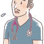 困った顔の男性の獣医師
