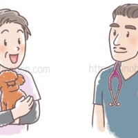 中年の女性の飼い主と男性獣医師