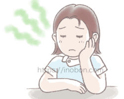 思い悩む看護師の女性 頬杖をついて沈んだ表情の女性の看護師